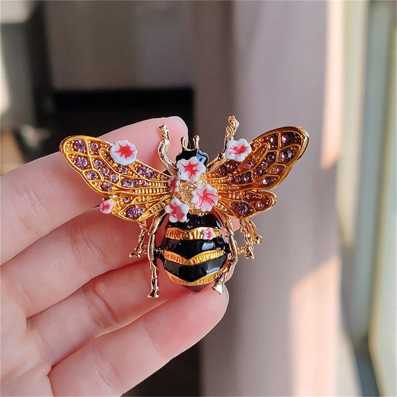 Magnifique Broche abeille dorée en fleurs