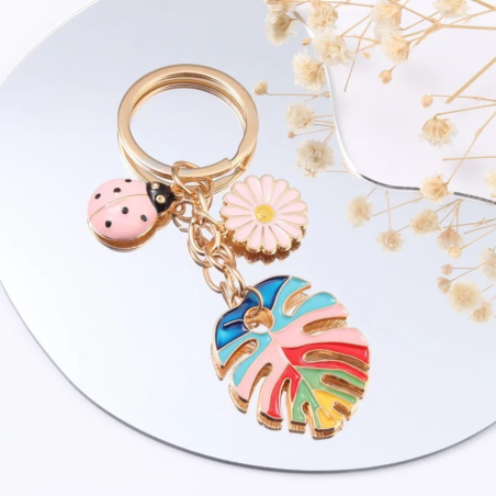 Porte-clés Coccinelle Coccinelle Pastel et Feuille Arc-en-Ciel