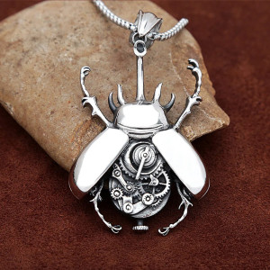 Steampunk Scarab Pendant in Steel – Symbolic Mechanical Jewelry