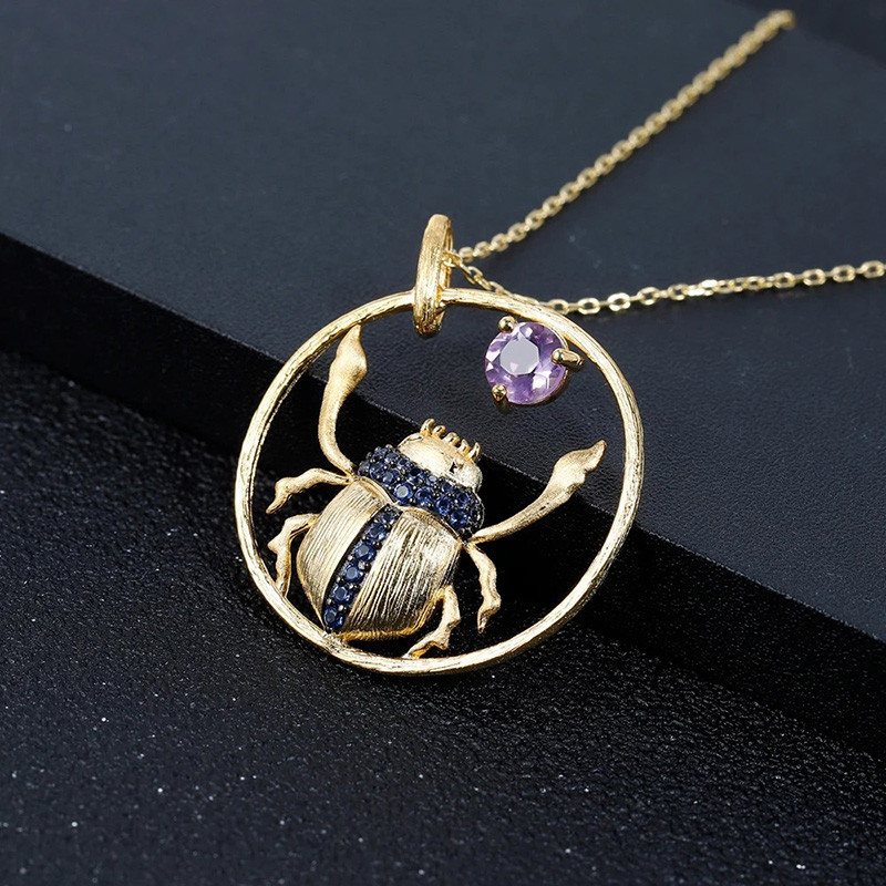 "Sun Dance" Scarab Necklace | Gold Circle & Purple Crystal