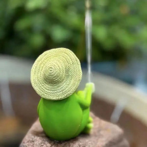 Solar Frog on Scooter Statue – Light-Up Garden Decor!
