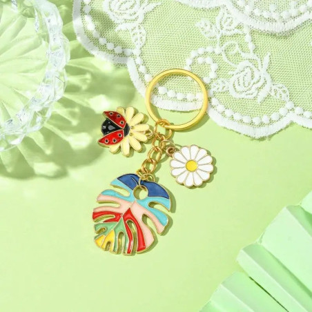 Porte-clés Coccinelle Élégance Tropicale et Marguerite