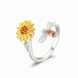 L'abeille qui butine un tournesol - bague tournante anti-stress