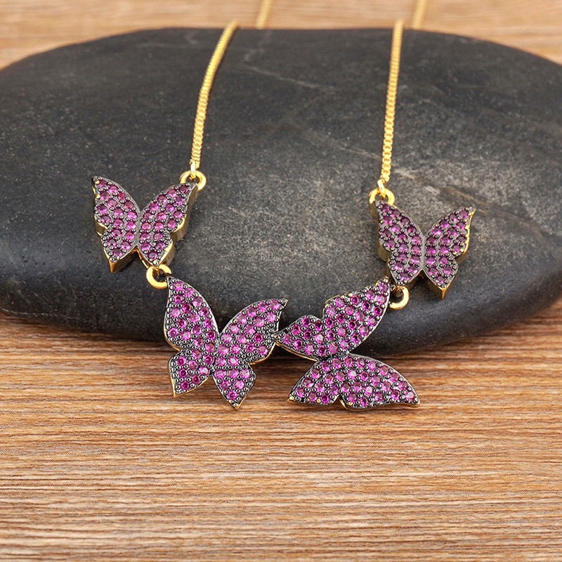 Collier papillon vol de 4 papillons strass - couleur violet