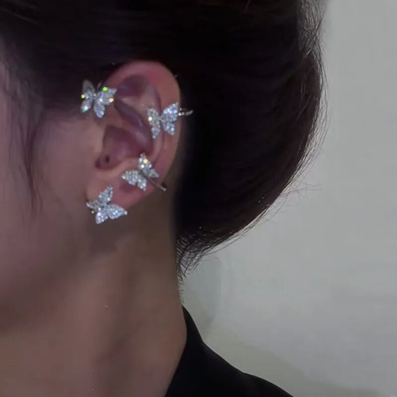 détails Boucles d'oreilles papillon - clip d'oreiles papillons couleur argent