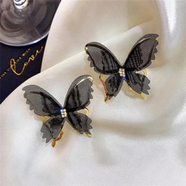 Boucles d'oreilles papillon en maille noire et blanche - couleur noir