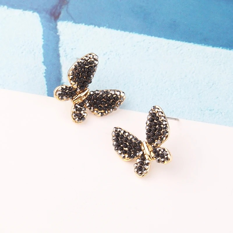Petites boucles d'oreilles papillons scintillants - couleur noir