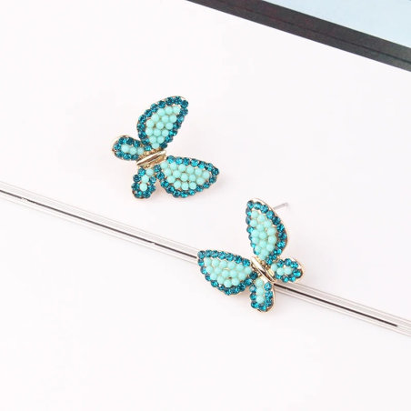 Petites boucles d'oreilles papillons scintillants - couleur vert