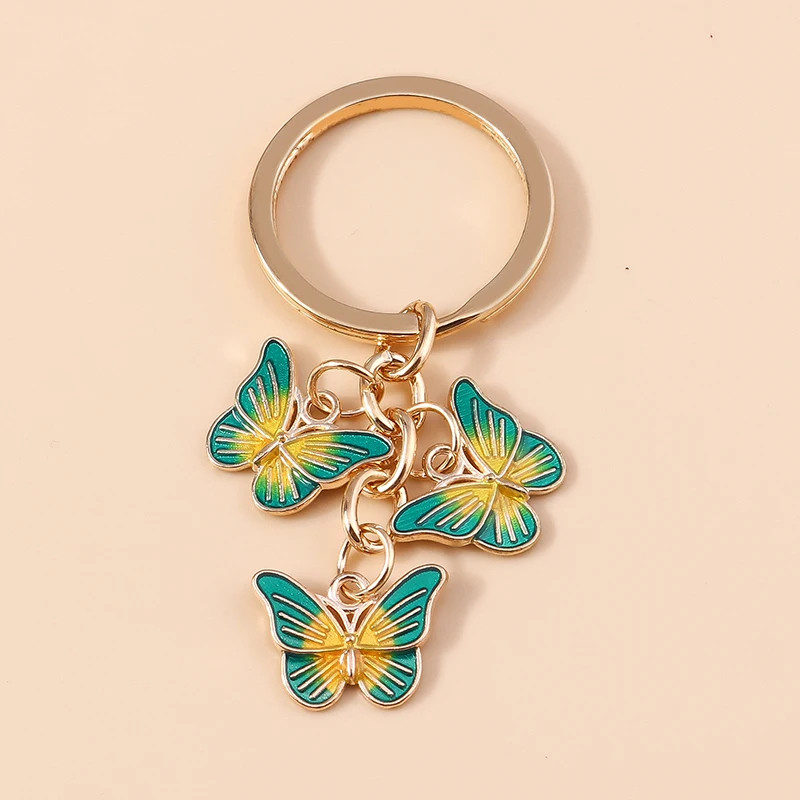 Porte-clés trois papillons en émail - couleur vert