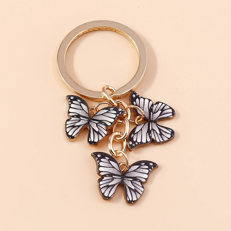 Porte-clés papillon en émail - couleur Blanc