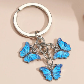 Porte-clés papillon en résine et strass - couleur bleu