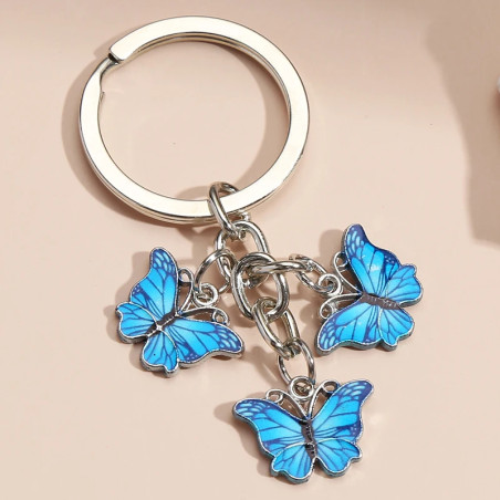Porte-clés papillon en résine et strass - couleur bleu