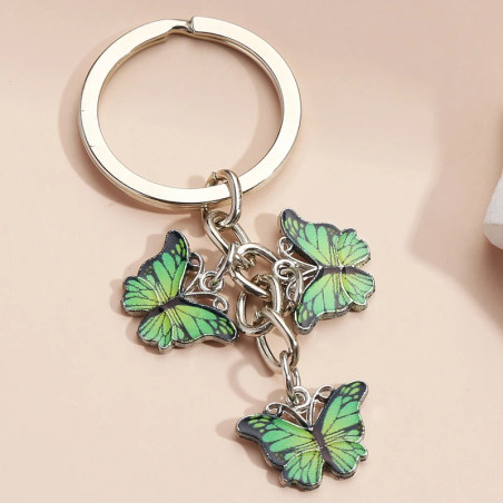 Porte-clés papillon en résine et strass - couleur vert