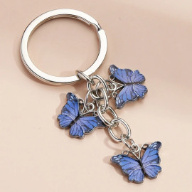 Porte-clés papillon en résine et strass - couleur violet