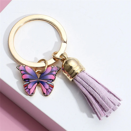 Porte-clés papillon avec grand pompon et petit papillon - couleur violet
