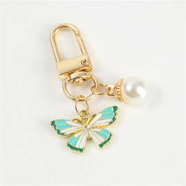 Porte-clés papillon aux couleurs vives avec perle Blanche - modèle 2