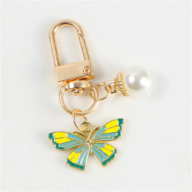 Porte-clés papillon aux couleurs vives avec perle Blanche - modèle 3