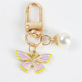 Porte-clés papillon aux couleurs vives avec perle Blanche - modèle 4
