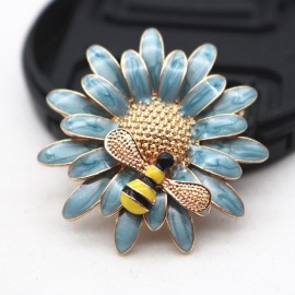Broche marguerite et abeille en émail bleu